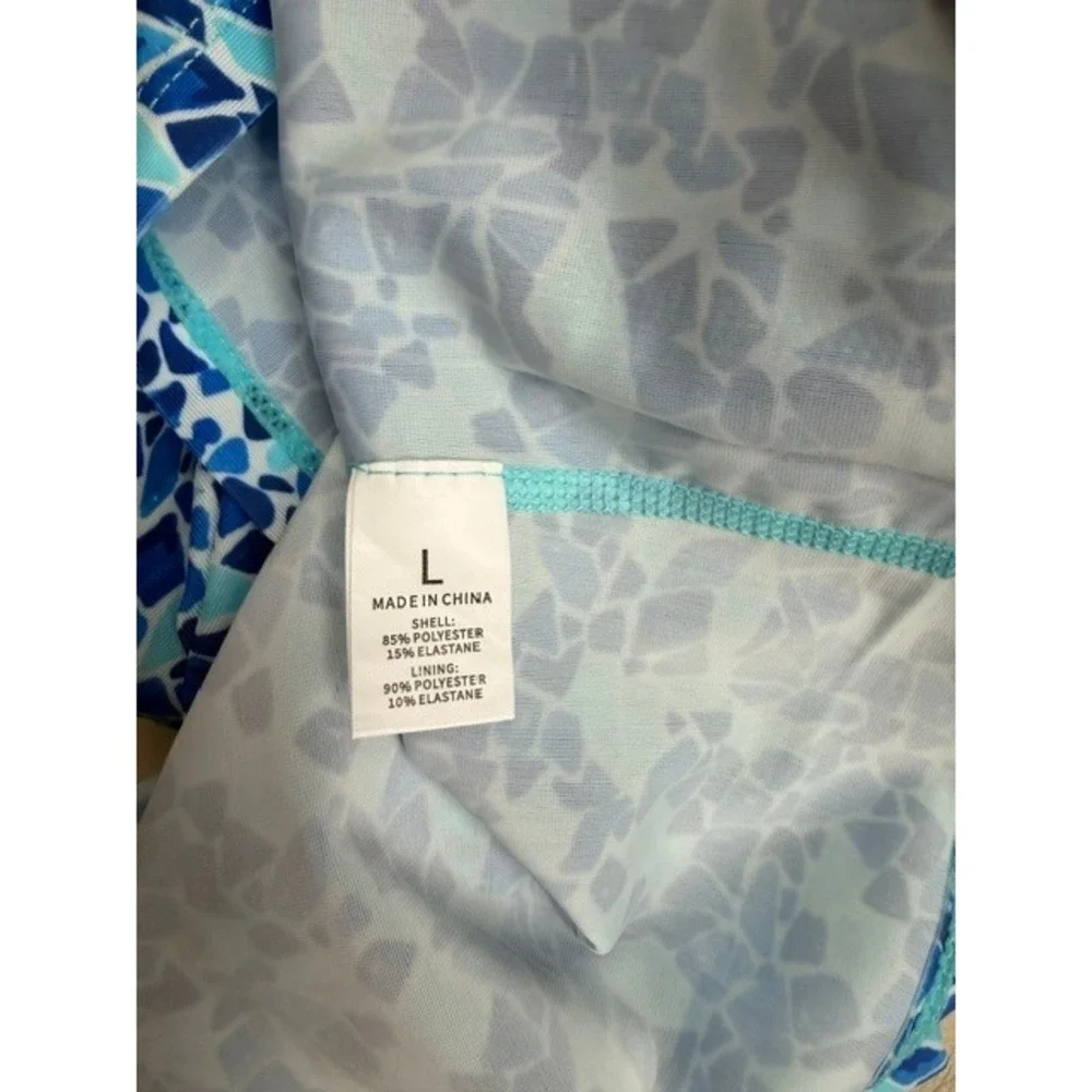 Women's blue swim shirt with built in shelf bra Size L